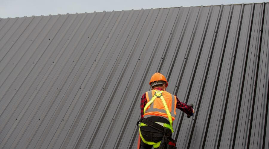 Professional metal roof installation services in Iuka, KS